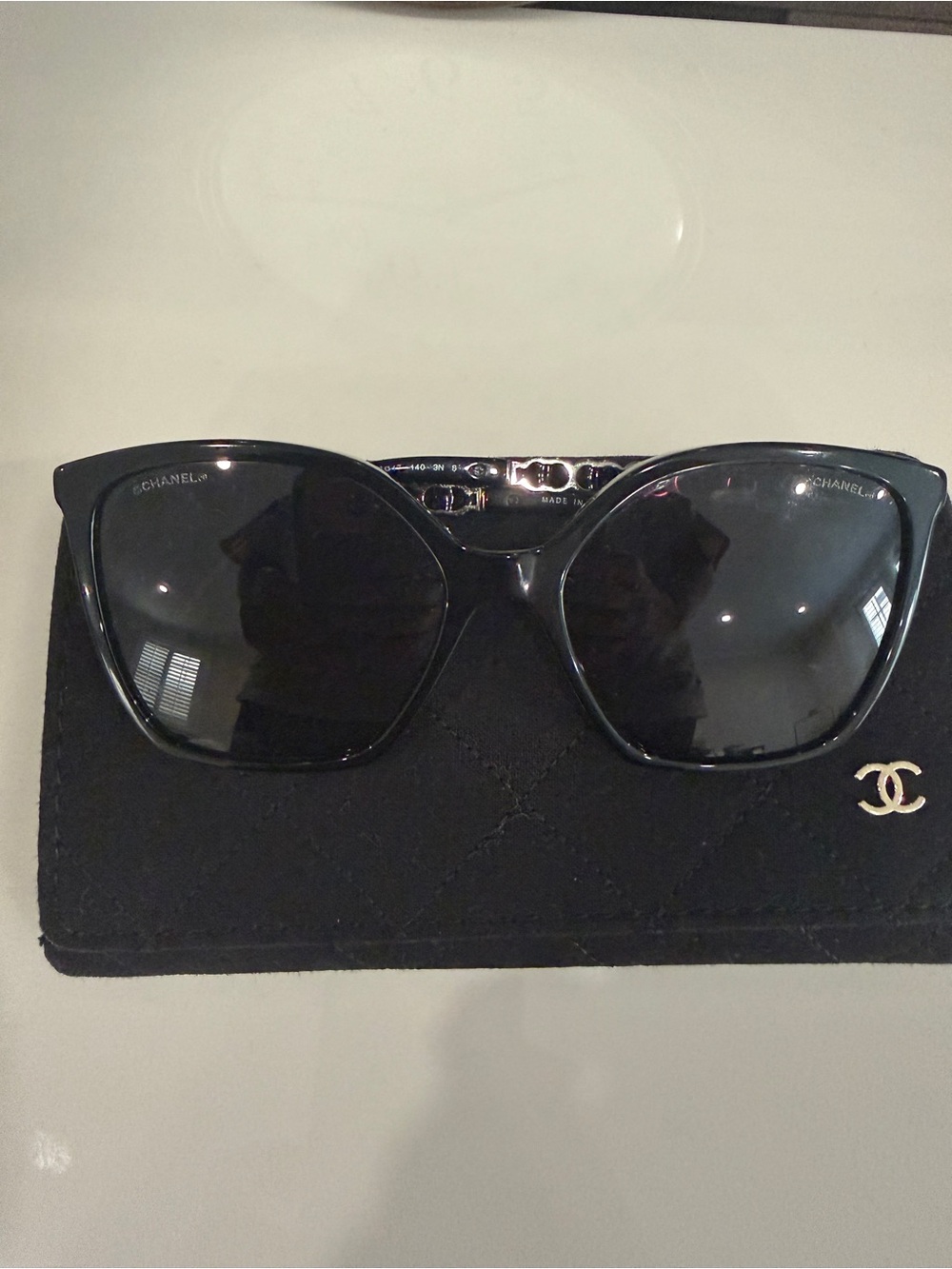 CHANEL Black Glossy Cat-Eye Sunglasses with Logo Accent
